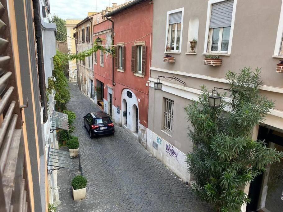 Studio Flat - Piazza San Cosimato By Yourhost Rome Bagian luar foto
